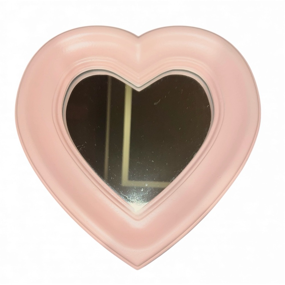 Pink heart shaped mirror.  12x12x2